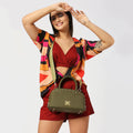 Stylish Marigold Satchel Bag with vibrant outfit and cheerful model.