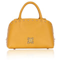 Stylish marigold satchel bag with studded accents and sleek design.